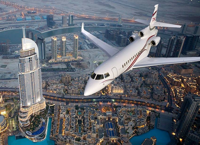Dassault Falcon 7x business jet flying over Dubai